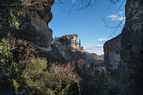 Holy Monastery of Saint Stephen perched atop a rock pinnacle in Meteora Greece Stock Photos