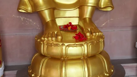 Holy offering by devotee to the holy feet of ultimate divine at temple Stock Footage 314297356