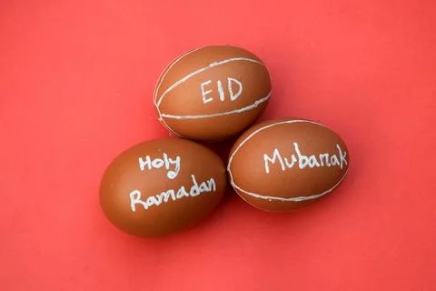 Holy Ramadan and Eid mubarak hand typography on the egg. 写真素材