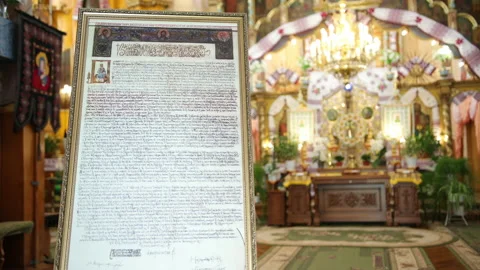 Holy scriptures with ancient texts are located in center of orthodox church. Stock Footage 152343530
