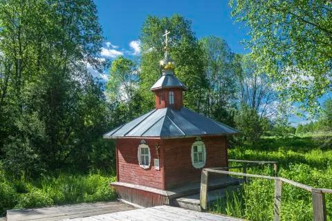 A holy source in honor of the Tikhvin Icon of the Mother of God, Russia. Stock Photos