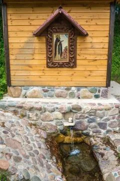 The holy spring of St. Macarius near the village of Karavaitsevo, Russia. Stock Photos