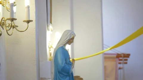 Holy statuette in the Church Video stock 77603853