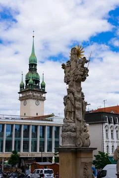 Holy trinity column and Old Town Hall tower Stock Photos