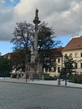 The Holy Trinity Column stands gracefully in Hradčanské náměstí Stock Photos