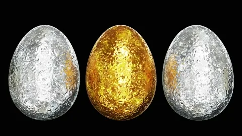 Holy Trinity gold Easter egg among two silver Easter eggs looping 3D animation Stock Footage 219856729