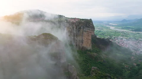 Holy Trinity Monastery in Greece, Meteora, lit by rising sun. Stock Footage 248471683