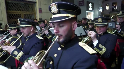 Holy Week Brass Band Marching During Procession in Malaga Stock Footage 336015194
