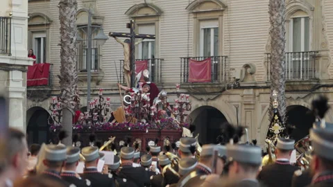 Holy Week procession featuring crucifixion float in Spanish town 스톡 동영상 333957526