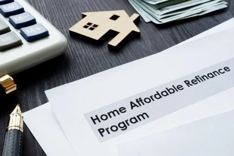 Home Affordable Refinance Program HARP papers on a desk. Stock Photos