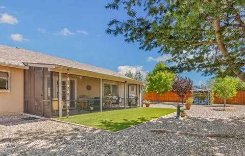 A Home backyard with a patio Stock Photos