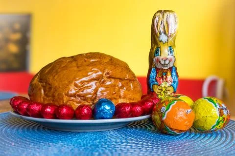 Home baked traditional Easter bread or Paska decorated for festive table, eegs Stock Photos
