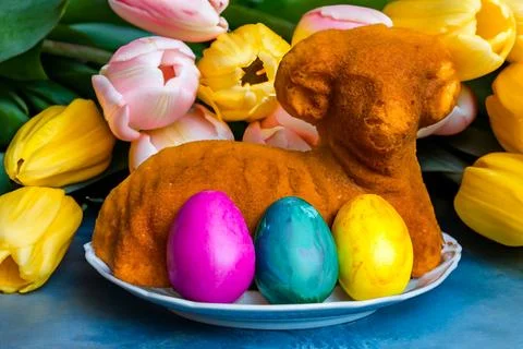 Home baked traditional Easter bread or Paska decorated for festive table, eegs Stock Photos