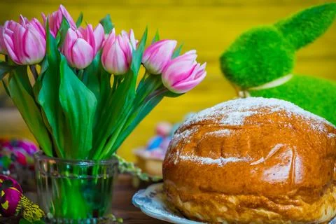 Home baked traditional Easter bread or Paska decorated for festive table, eegs Stock Photos