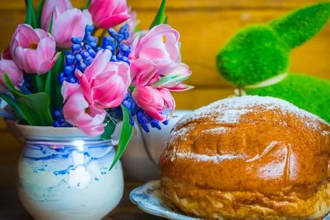 Home baked traditional Easter bread or Paska decorated for festive table, eegs Stock Photos