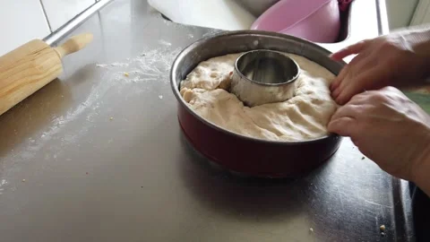 Home Baking Bread Dough Pressed Into Ring Pan by Hands Видео 332563830