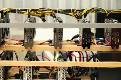 A home-based cryptocurrency mining farm, featuring multiple video cards arr.. Stock Photos
