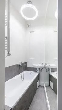 Home Bathroom Interior. Bath and Sink. Mirror, Heater, LED Light. White Col.. Stock Photos