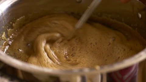 Home Brew Beer making. Boiling of a dark beer liquid in slow motion 4K Video stock 74768275