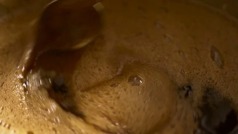 Home Brew Beer making. Boiling of a dark beer liquid in slow motion 4K Vídeo Stock 74768421