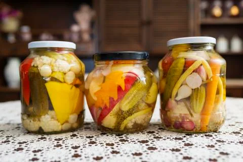 Home Canning of Summer Vegetables Stored on the Table. Stock Photos