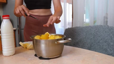 Home Chef Making Smooth Mashed Potatoes With Milk And Butter Stock Footage 328497172