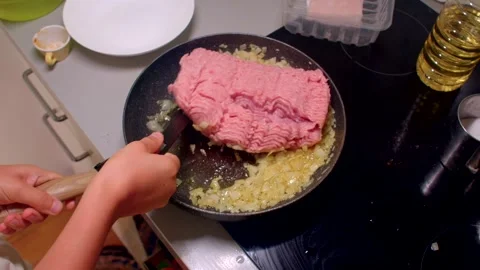 Home chef skillfully prepares a delicious dish in a cooking video Stock Footage 318847479