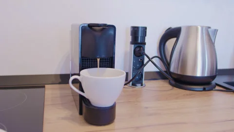 Home coffee machine making aromatic cappuccino. Home coffee machine morning Stock Footage 264726298