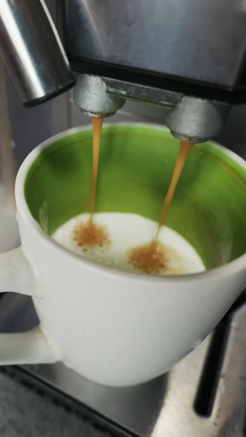 Home Coffee Machine Pouring Fresh Espresso Into Milk Mug Close Up Stock Footage 334109909