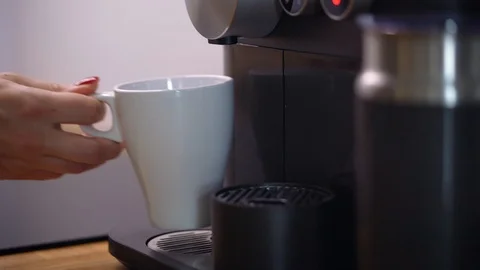 Home coffee machine prepares a cup of fresh coffee Stock Footage 99338521