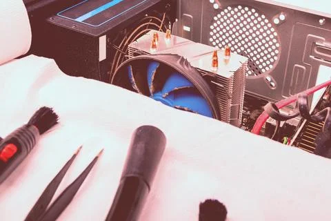 The home computer is covered in dust. cable in the mud. concept cleaning and  Stock Photos