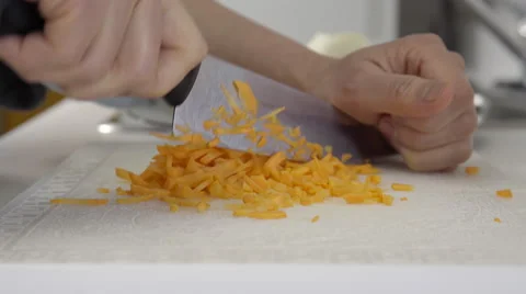 Home cook dicing carrots. 4K UHD. Stock-Footage 49970327