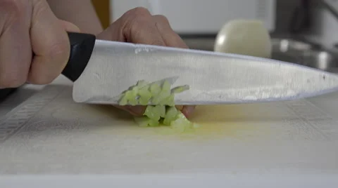 Home cook dicing celery. 4K UHD. Stock Footage 49970891