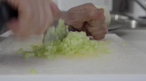 Home cook dicing celery. 4K UHD. Stock Footage 49971649