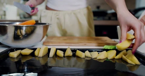 Home-cooked vegetables in the kitchen. Slow motion. Stock Footage 149518658