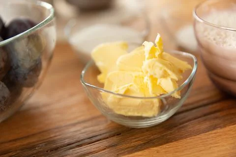 Home cooking baking plum cake with ingredients on wooden table, top view Stock Photos
