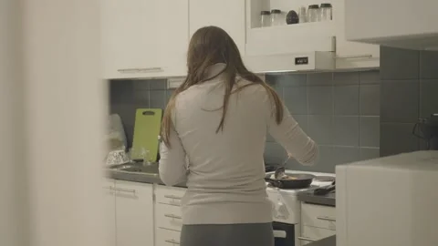 Home Cooking in a Modern Kitchen Video stock 333449393
