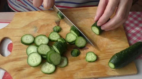 Home cooking process.  The chef makes a cucumber salad.  Healthy food concept Stock Footage 155197891