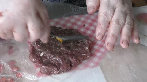 Home cooking process.  The chef makes stuffed deer cutlets. Video stock 155227788
