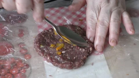 Home cooking process.  The chef makes stuffed deer cutlets. Video stock 155228083