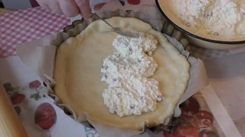 Home cooking process.  The chef prepares a pie stuffed with cottage cheese. Video stock 155163997