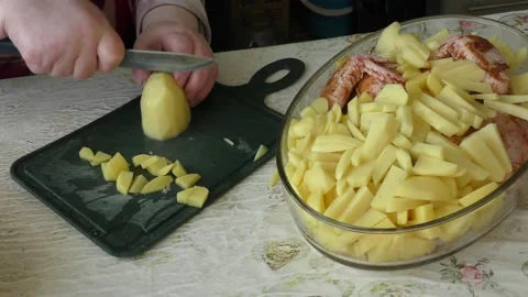 Home cooking process.  the chef prepares the chicken. Stock Footage 155498220