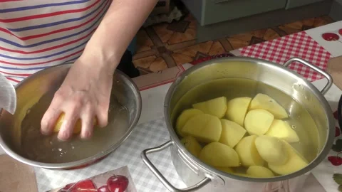 Home cooking process.  The cook is peeling potatoes.  Healthy food concept Video stock 155187596