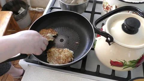 Home cooking process.  the cook prepares potato pancakes.  healthy food concept Video stock 155183682