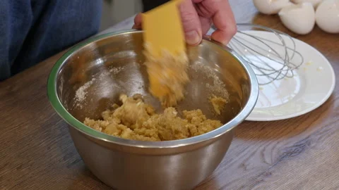 Home cooking. Process preparation dough, male hands mixing dough Stock Footage 217449916