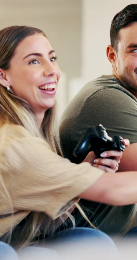 Home, couple and playing with controller, video game and tech for virtual sport, Stock Footage 336856516