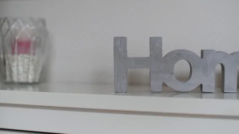 Home. Decor home. Message written in stone blocks Stock Footage 73429688