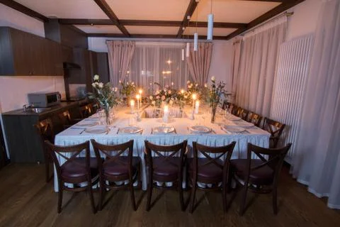 Home decorations. Festive table decorations, flowers and tableware Photos