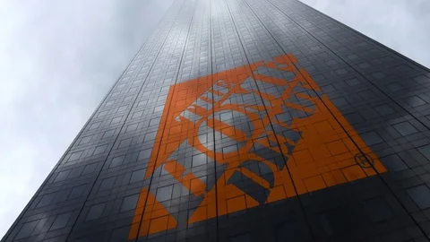The Home Depot logo on a skyscraper facade reflecting clouds, time lapse Stock Footage 81065296
