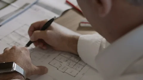 Home designer drawing floor plans Stock Footage 124879114